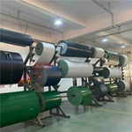 Rack de armazenamento de rolos de esteira de tecido resistente para uso no chão